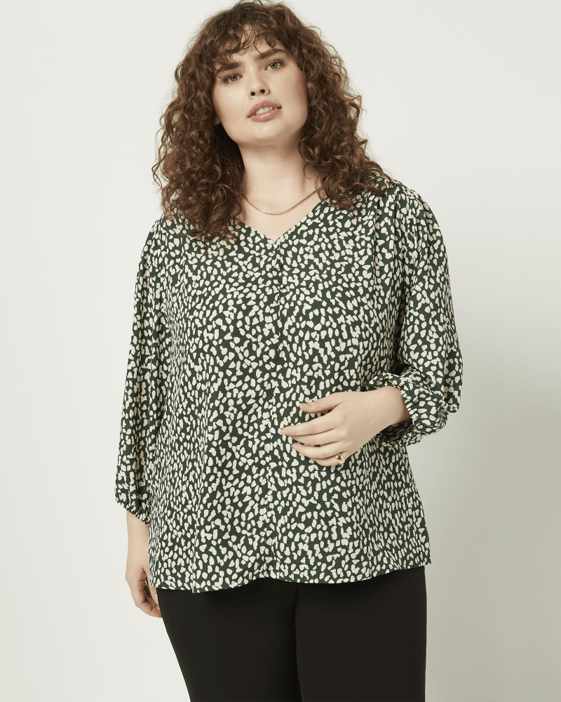 Front of a model wearing a size 2X Christine Three-Quarter Sleeve Peasant Top in Forest Green / Ivory by Molly & Isadora. | dia_product_style_image_id:216043